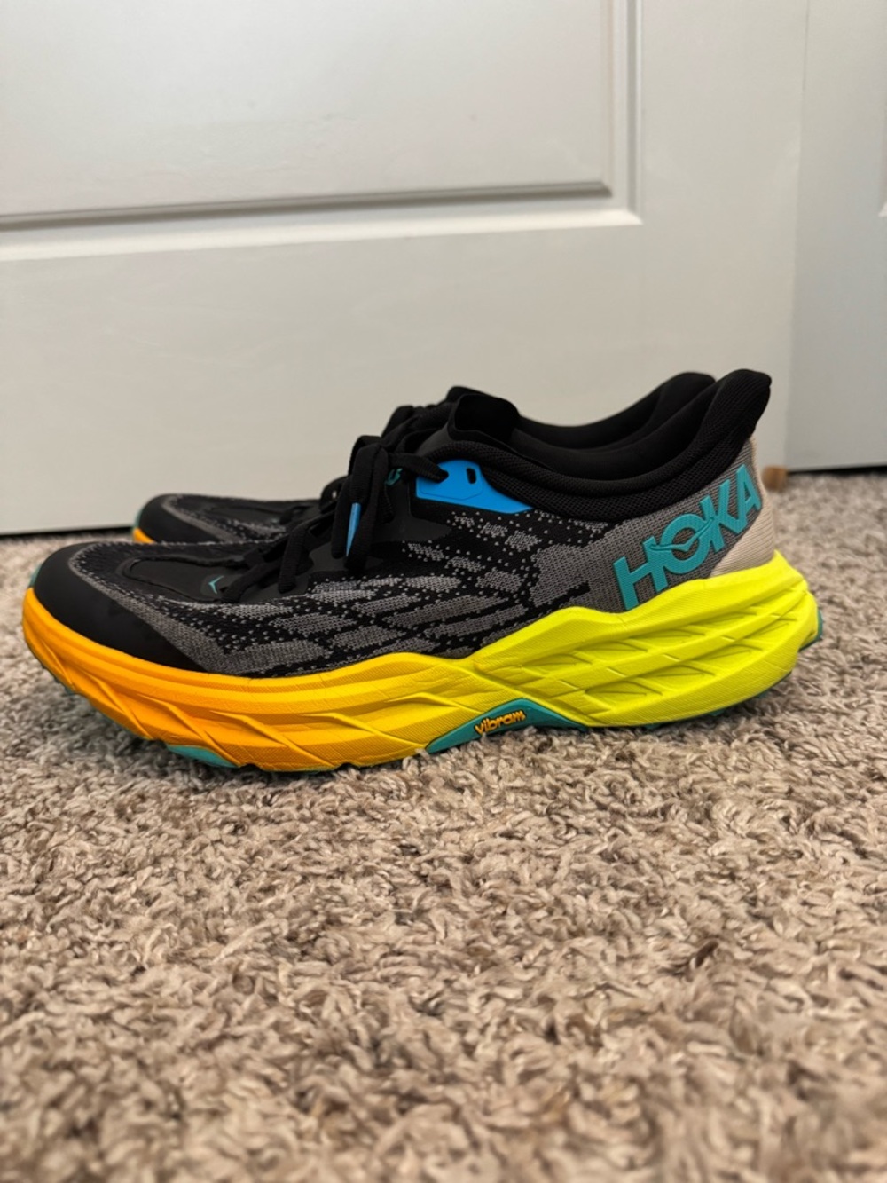HOKA Speedgoat 5 Men’s 9.5 Black and Yellow Running Trail Shoes